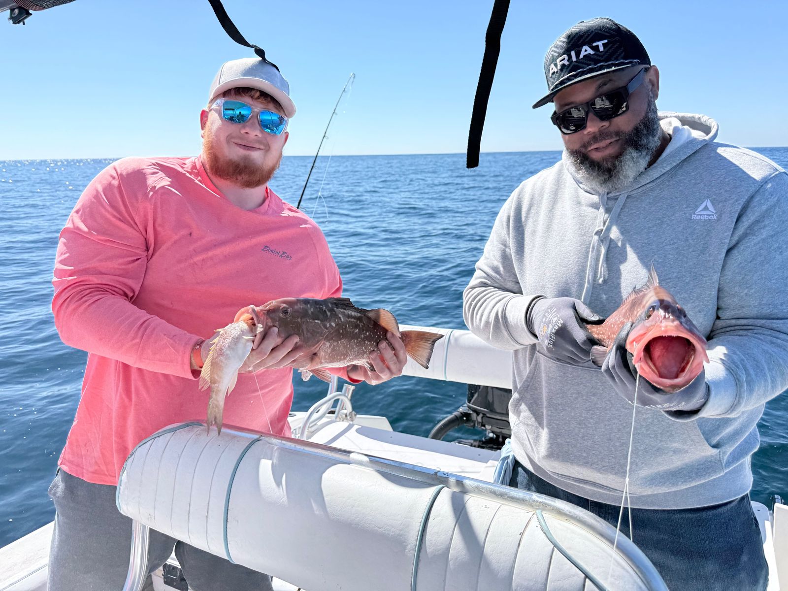Red Grouper fish being reeled in during a fishing tour in FL