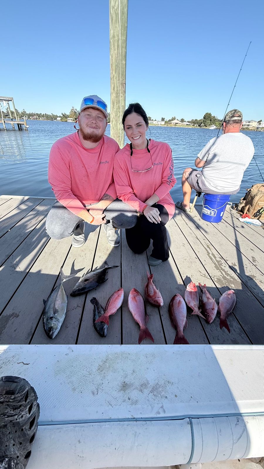 Two people enjoying fishing tours in FL